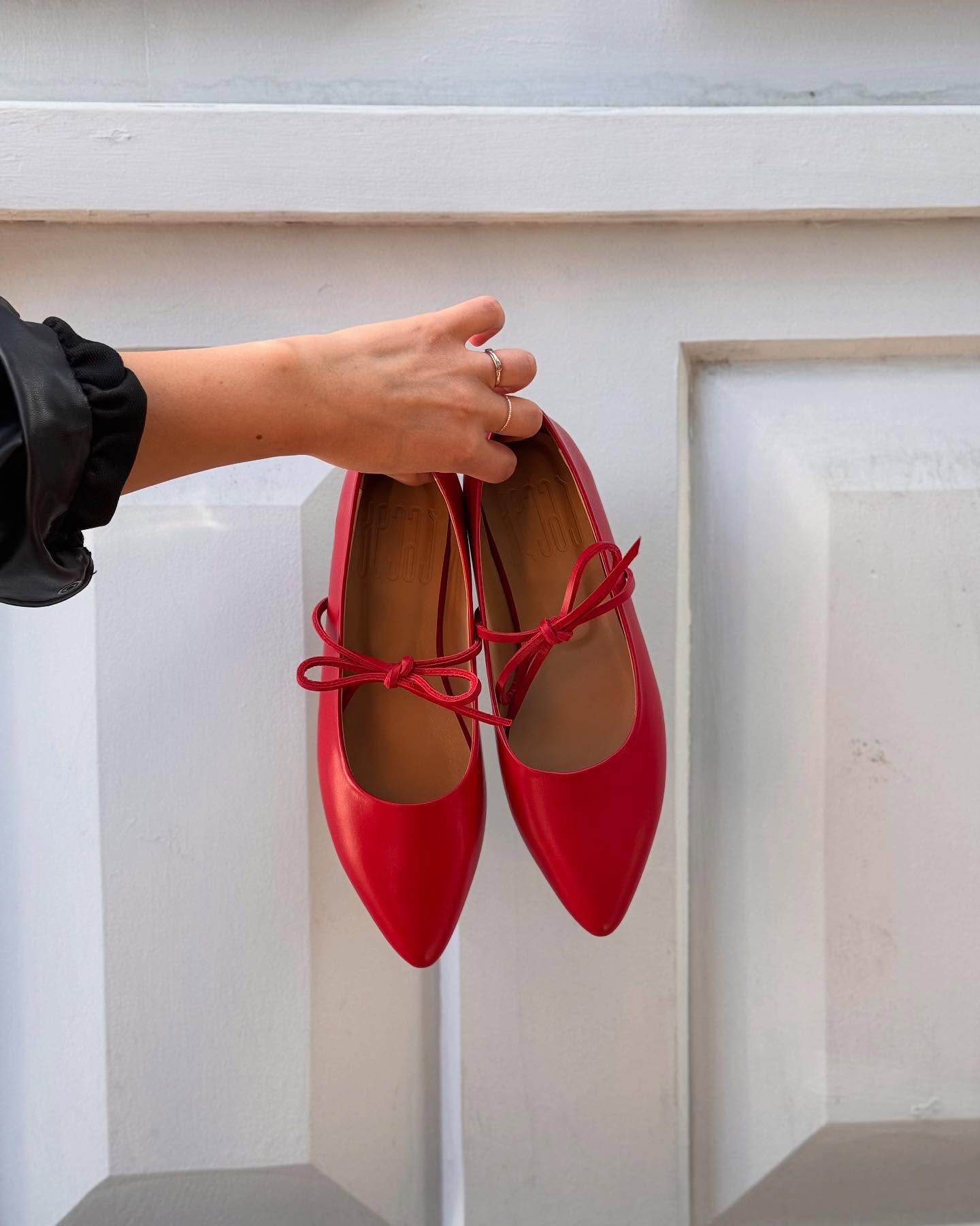 Red ballerina flats