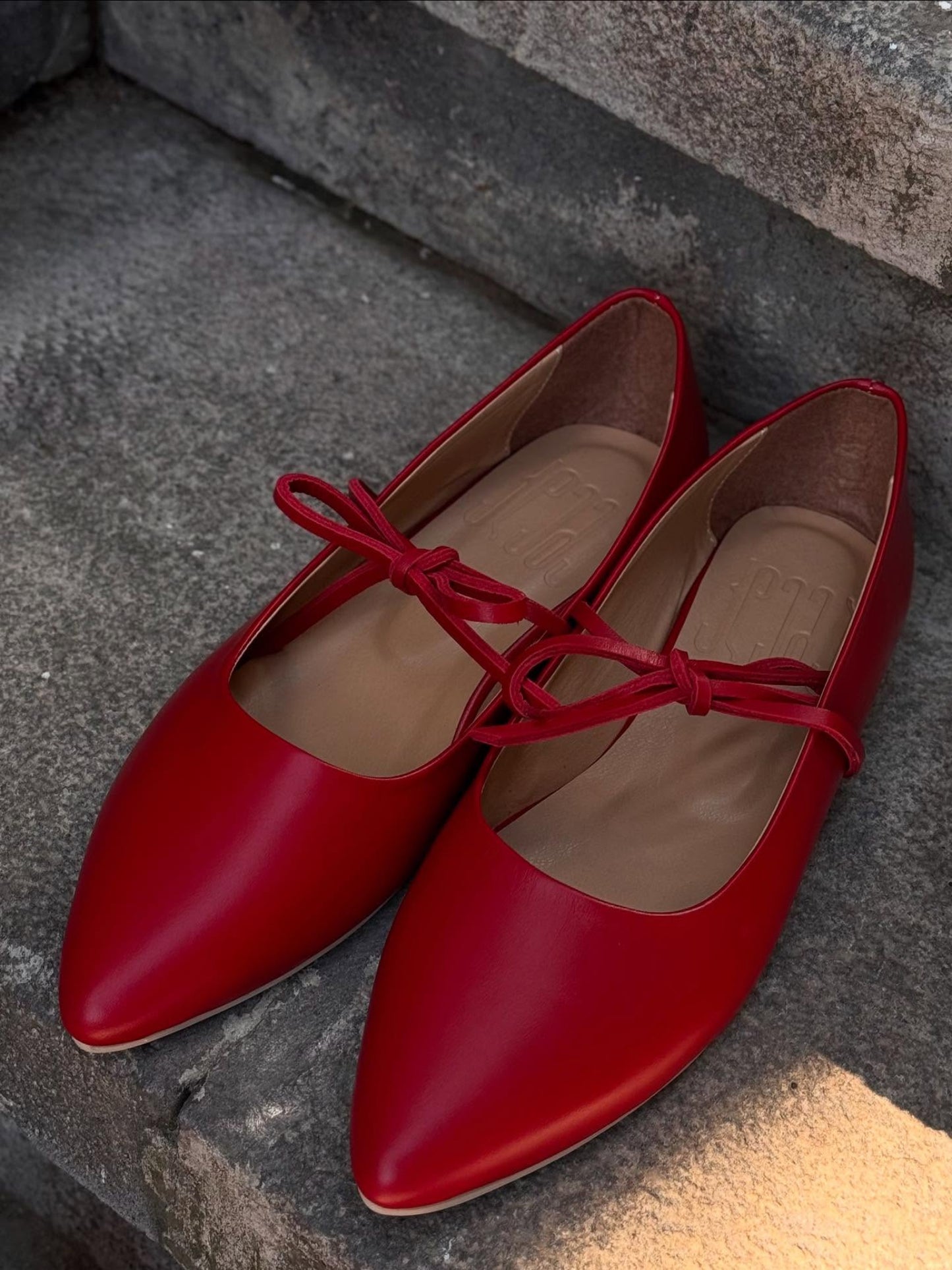 Red ballerina flats