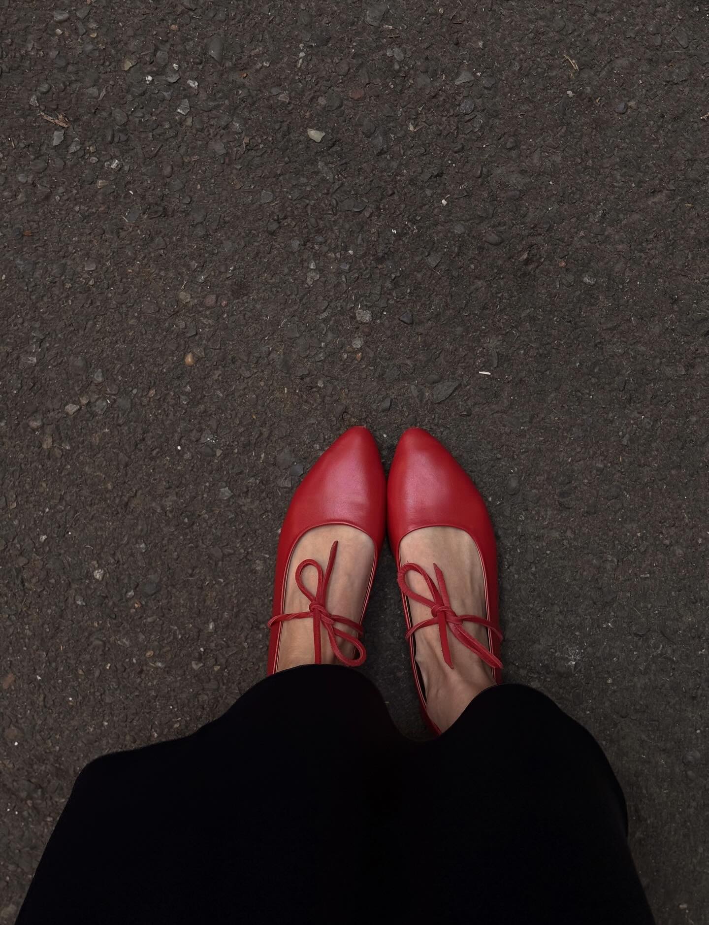 Red ballerina flats